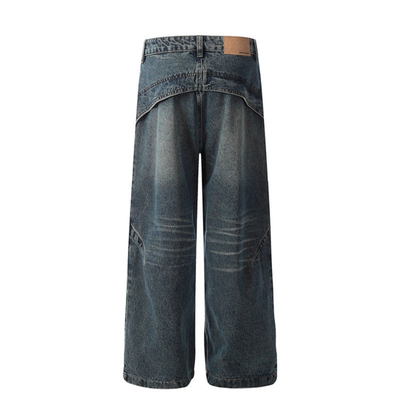Deconstructing Washed Curved Knife Jeans