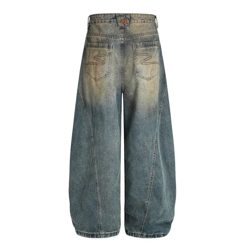 Washed Denim Jeans with Curved Edges and Old Silhouette